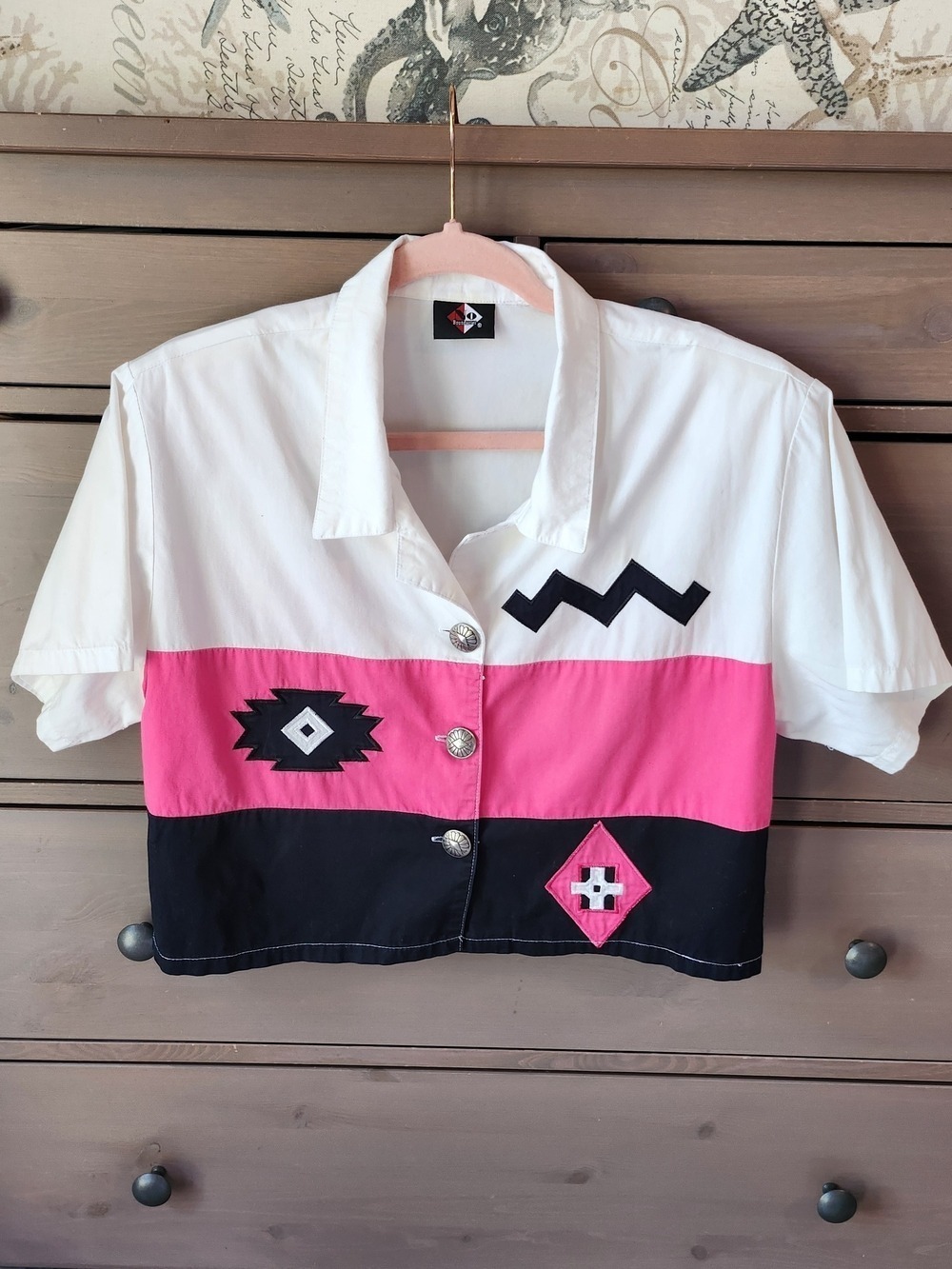 Step out of the 90's in this amazing color blocked top